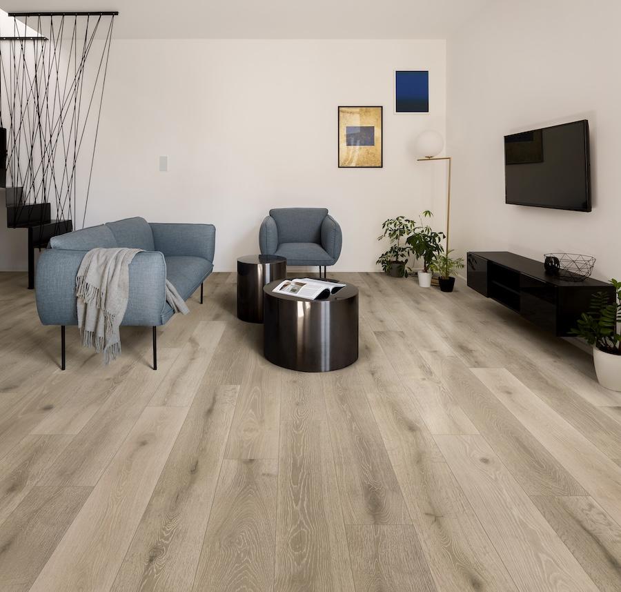 Elegant design living room with tv and stones river oak floors