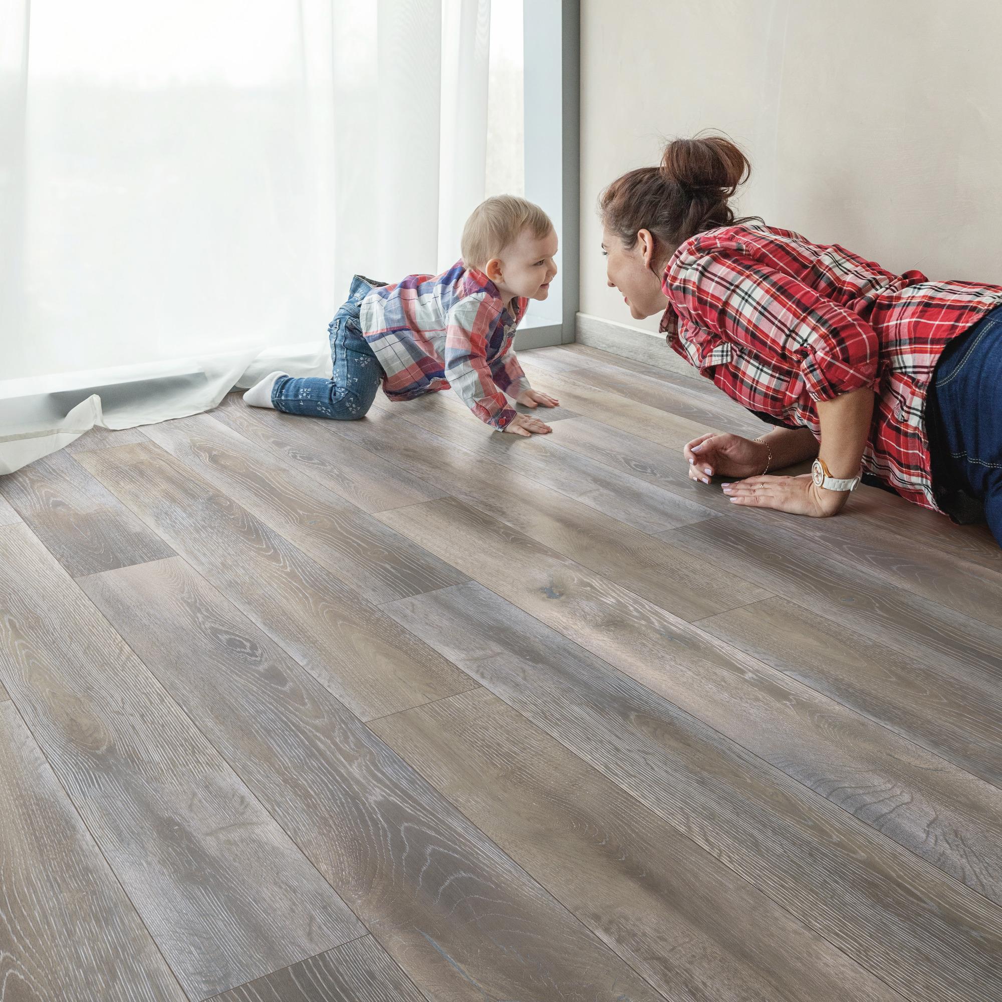 mother and child playing on lone jack oak floors